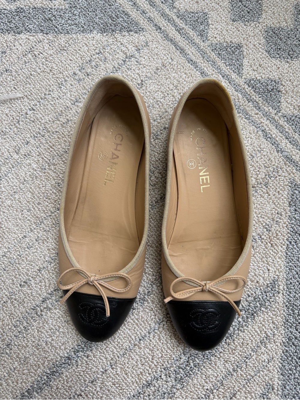 CHANEL Beige and Black Leather Cap-Toe Ballet Flats